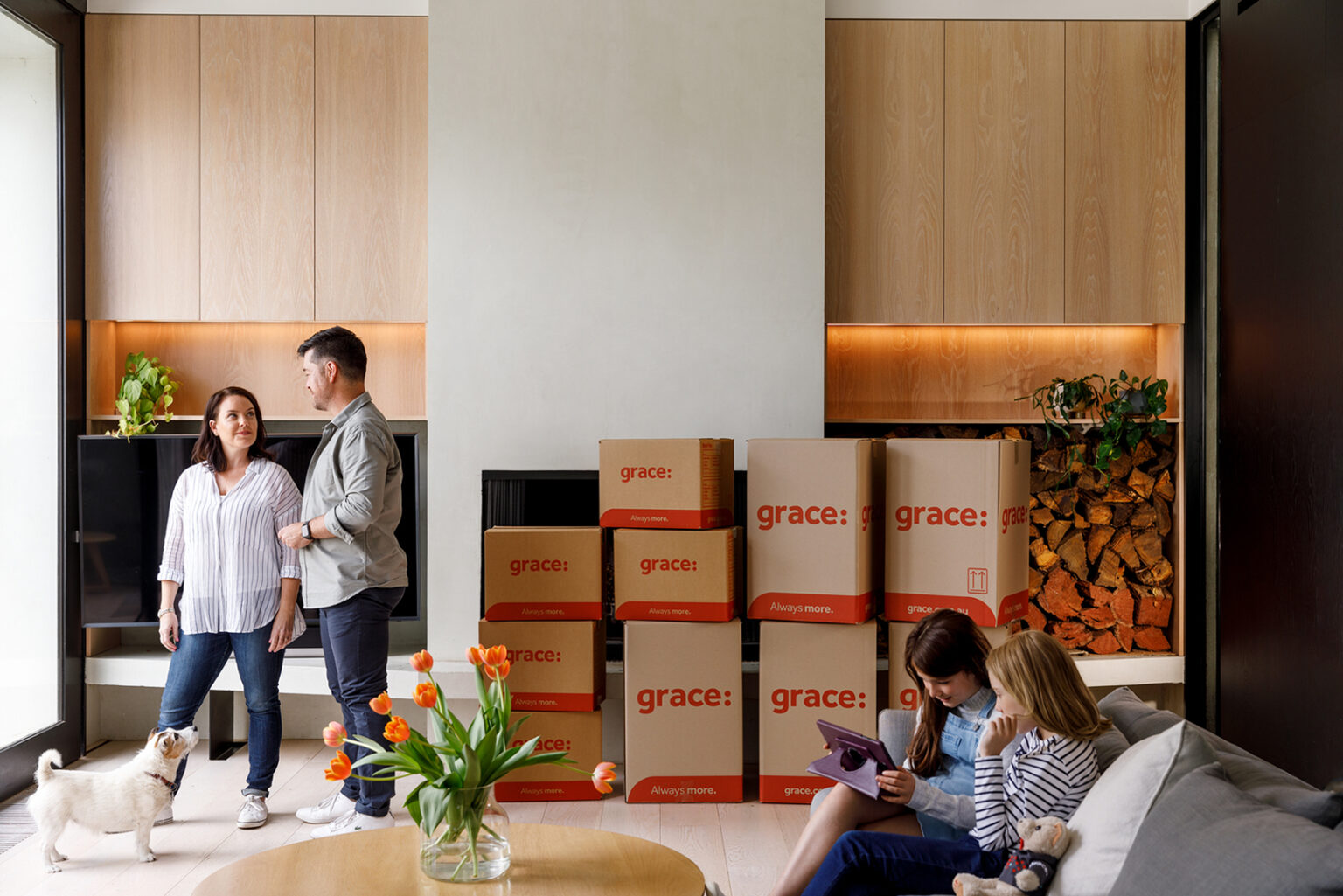 Family prepared for interstate relocation, with Grace boxes visible in the background