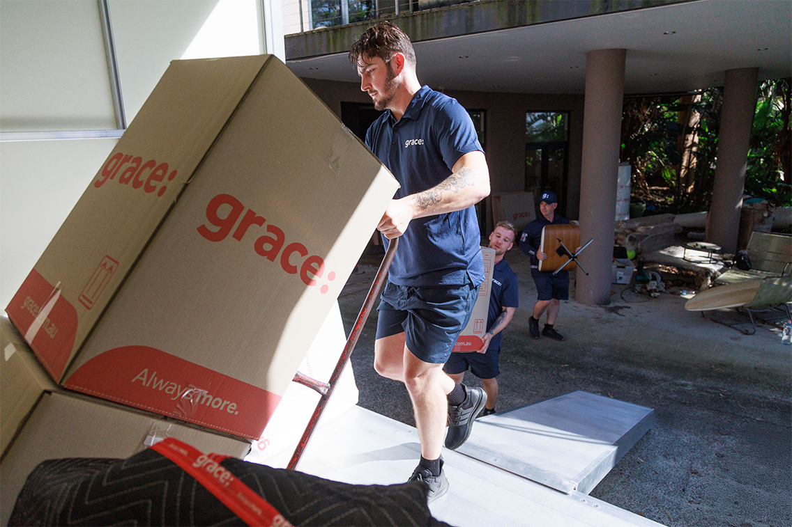 man moving a box