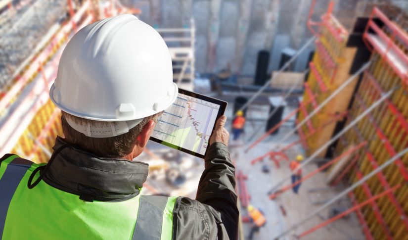 engineer architect construction worker on construction site with tablet computer Construction